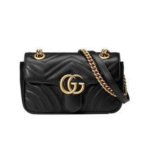 Gucci GG Marmont Mini Leather Quilted shoulder Bag Black Gold. Gently used.
